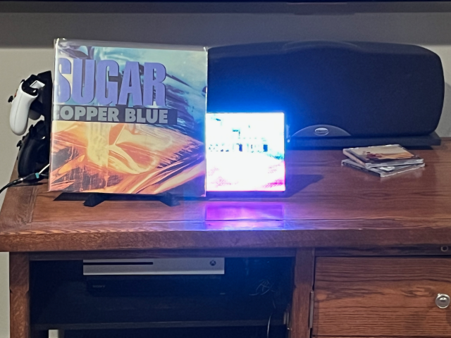 Sugar's Copper Blue album standing up  next to itself displayed on a 64 by 64 matrix